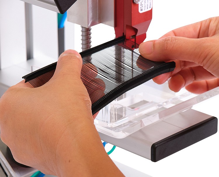 Automated Apparel Tagging Machine